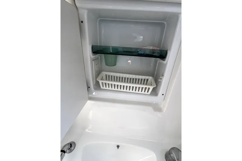 Slide: The Image of Interior storage compartment on a 2006 Beneteau Oceanis 393 yacht. - 51