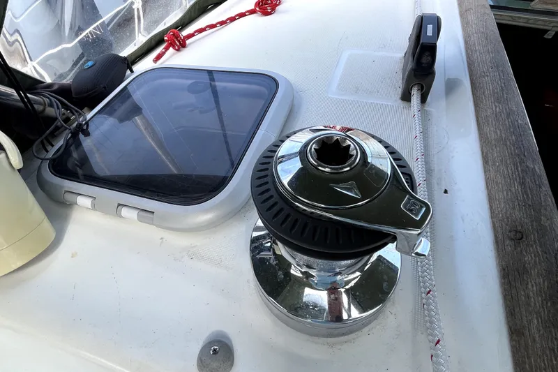 Slide: The Image of Winch and hatch on 2006 Beneteau Oceanis 393 sailboat deck. - 75