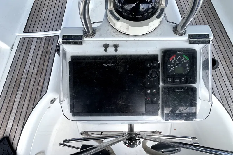 Slide: The Image of Cockpit of 2006 Beneteau Oceanis 393 with navigation instruments and compass. - 73