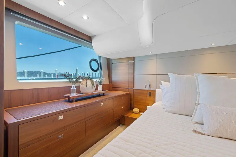 Slide: The Image of Luxurious bedroom interior of 2015 Princess 60 Flybridge Motor Yacht with elegant wood finish. - 38