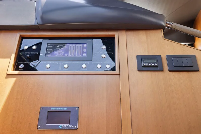 Slide: The Image of Control panel of a 2015 Princess 60 Flybridge Motor Yacht with Spectra Watermakers system. - 29