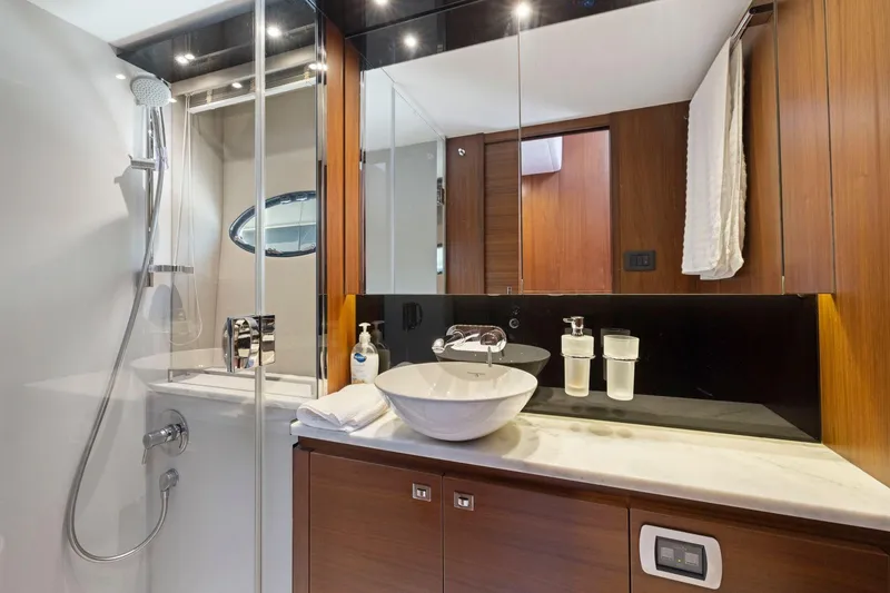 Slide: The Image of Luxurious bathroom in 2015 Princess 60 Flybridge Motor Yacht with modern fixtures and elegant design. - 33