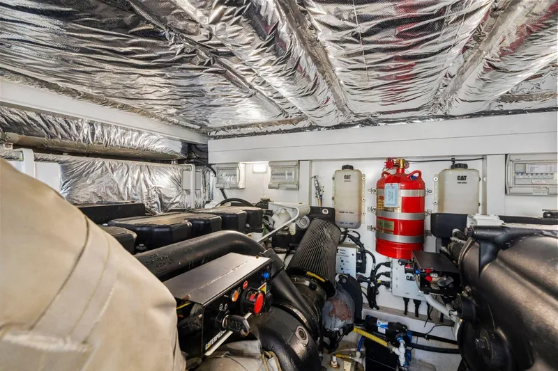 Slide: The Image of Engine room of 2015 Princess 60 Flybridge Motor Yacht with Caterpillar engines and fire suppression system. - 66