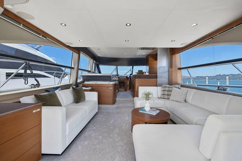 Slide: The Image of Luxurious interior of 2015 Princess 60 Flybridge Motor Yacht with elegant seating and panoramic windows. - 15