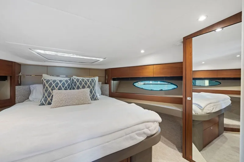 Slide: The Image of Luxurious bedroom interior of 2015 Princess 60 Flybridge Motor Yacht with elegant bedding. - 41