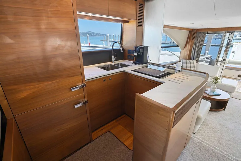Slide: The Image of Luxurious kitchen interior of 2015 Princess 60 Flybridge Motor Yacht with modern amenities. - 26