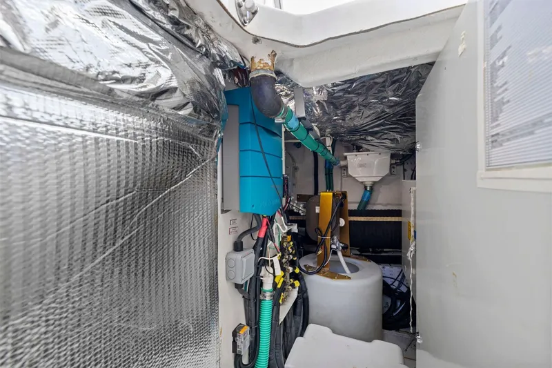Slide: The Image of Engine room of 2015 Princess 60 Flybridge Motor Yacht with insulated walls and equipment. - 60