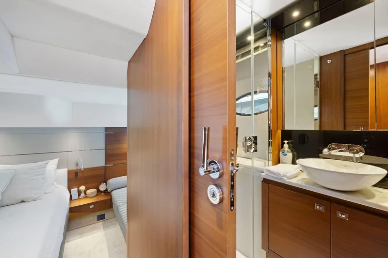 Slide: The Image of Luxurious interior of 2015 Princess 60 Flybridge Motor Yacht with modern bathroom and cozy bedroom. - 32