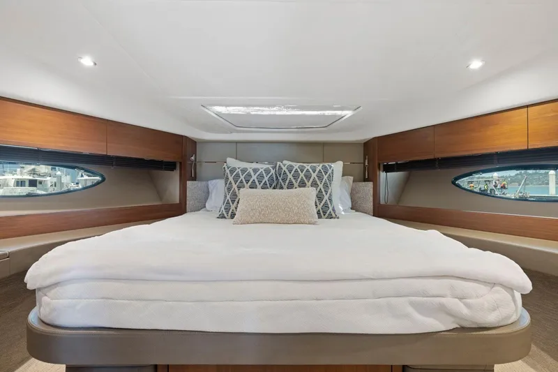 Slide: The Image of Luxurious bedroom interior of 2015 Princess 60 Flybridge Motor Yacht with elegant bedding. - 40