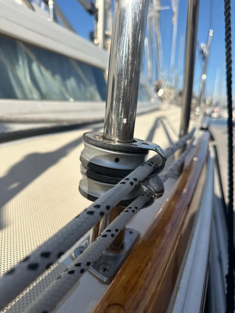 Slide: The Image of Close-up of 2008 Outbound 46 sailboat deck with rigging and stainless steel fittings. - 13