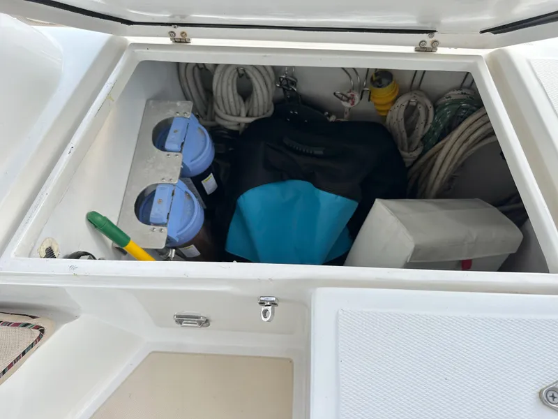Slide: The Image of Storage compartment on a 2008 Outbound 46 yacht with ropes and equipment. - 30