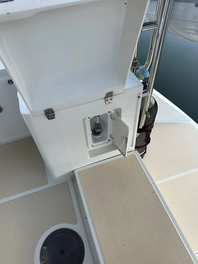 Slide: The Image of Open storage compartment on 2008 Outbound 46 yacht deck. - 32