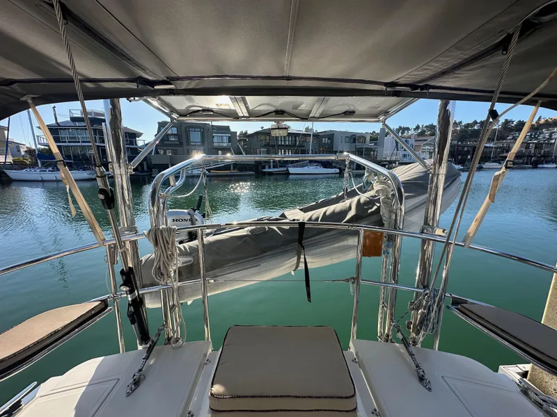 Slide: The Image of View from the deck of a 2008 Outbound 46 yacht in a marina. - 35