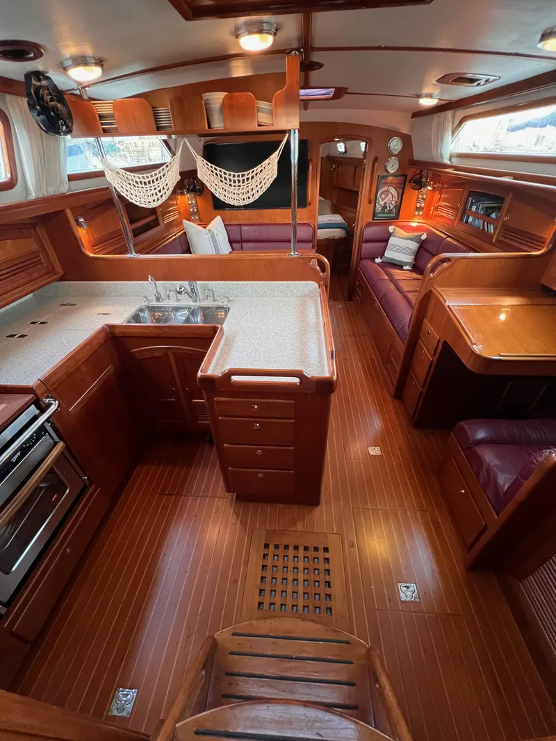 Slide: The Image of Luxurious 2008 Outbound 46 yacht interior with elegant wood finish and modern amenities. - 44
