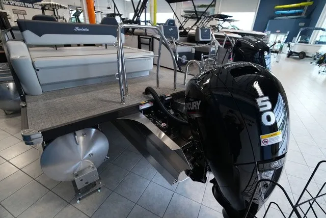 Slide: The Image of The image shows a Barletta Sanza 22 UC boat with a 150 HP Mercury outboard motor. - 29