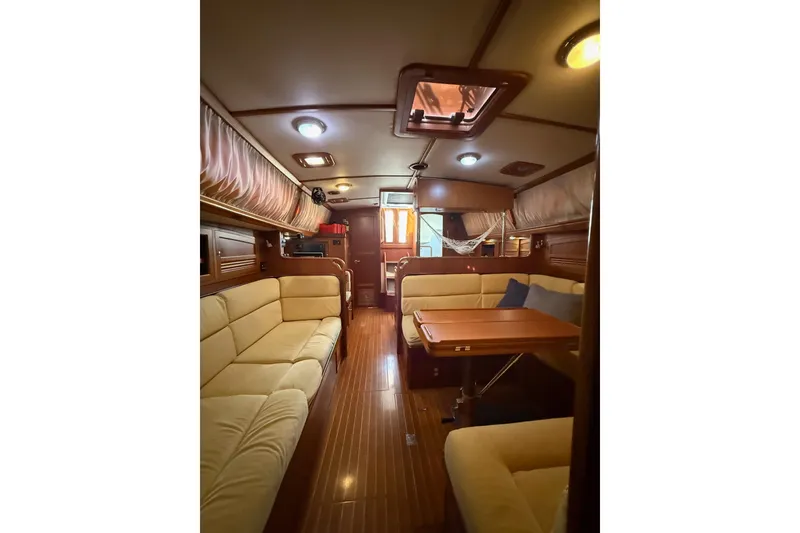 Slide: The Image of Luxurious interior of a 2011 Outbound 46 yacht looking aft from the master stateroom  - 52