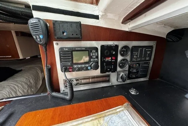 Slide: The Image of Control panel of a 1973 Custom BILL LEE 40 sailboat with radio and navigation equipment. - 36