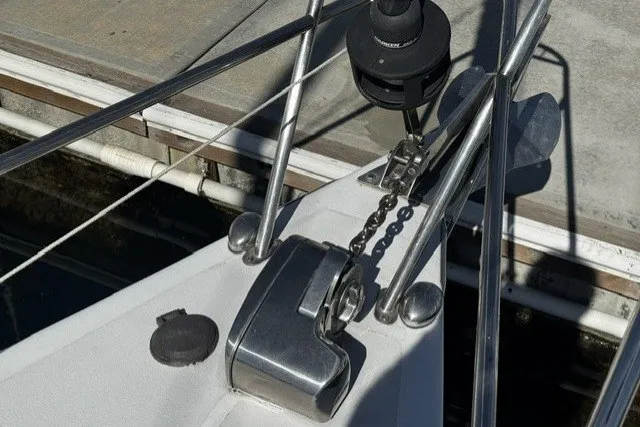 Slide: The Image of Bow of a 1973 Custom BILL LEE 40 sailboat with anchor chain and winch. - 4
