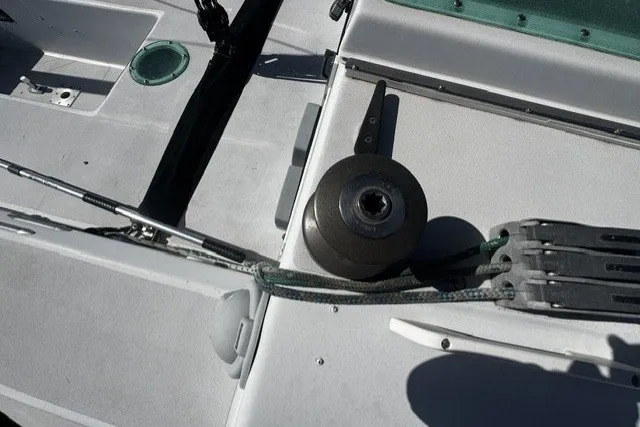 Slide: The Image of Deck of 1973 Custom BILL LEE 40 sailboat with winch and rigging details. - 7