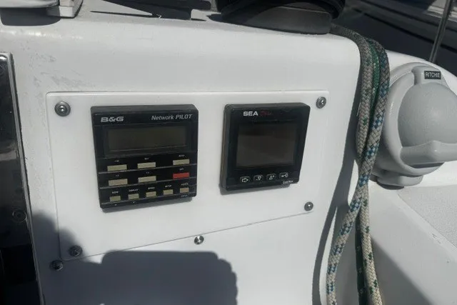 Slide: The Image of Control panel of 1973 Custom BILL LEE 40 sailboat with navigation instruments. - 17