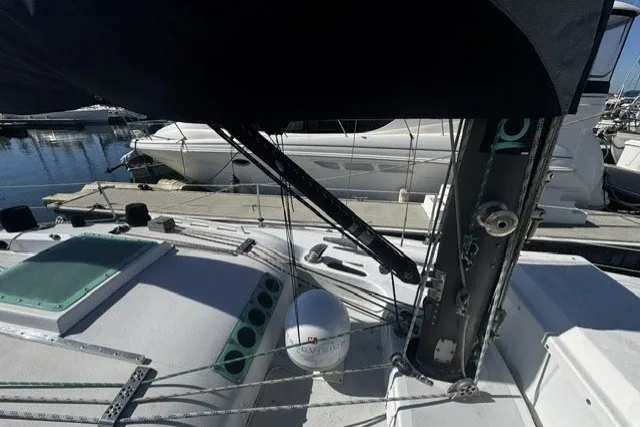 Slide: The Image of Sailboat deck view of 1973 Custom BILL LEE 40, docked at marina. - 6