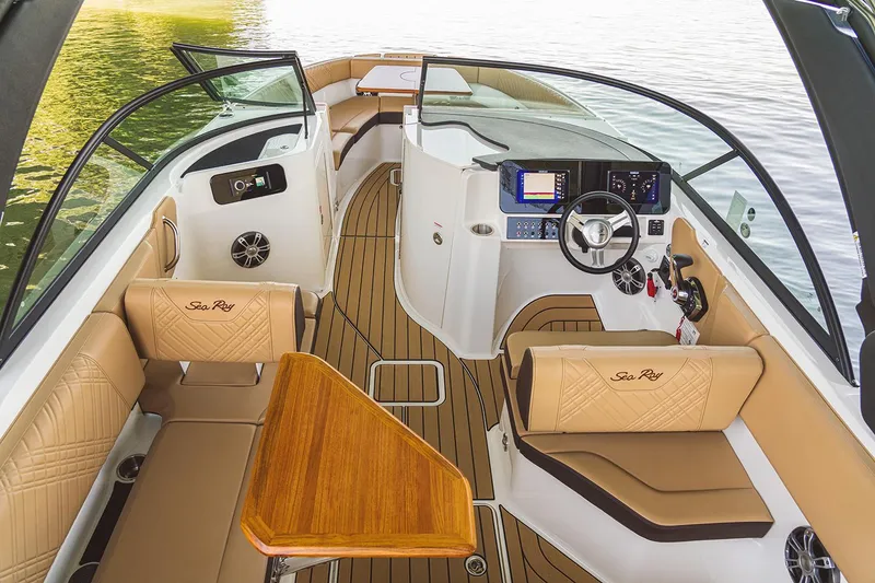 Slide: The Image of Manufacturer Provided Image: Luxurious interior of 2026 Sea Ray SDX 230 boat with elegant seating and modern dashboard. - 5