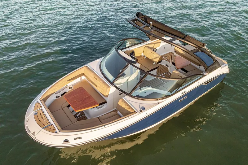 Slide: The Image of Manufacturer Provided Image: 2026 Sea Ray SDX 230 boat on water, featuring spacious seating and elegant design. - 1