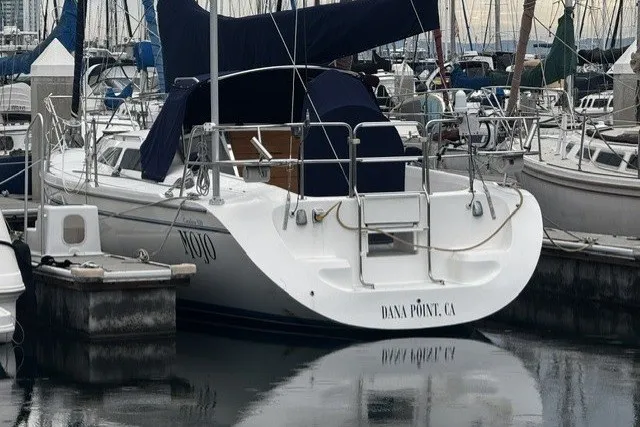 Slide: The Image of Catalina 320 sailboat, 2000 model, docked at Dana Point marina. - 3