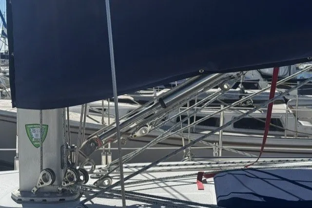 Slide: The Image of Sailboat rigging on a 2000 Catalina 320, docked in a marina. - 4
