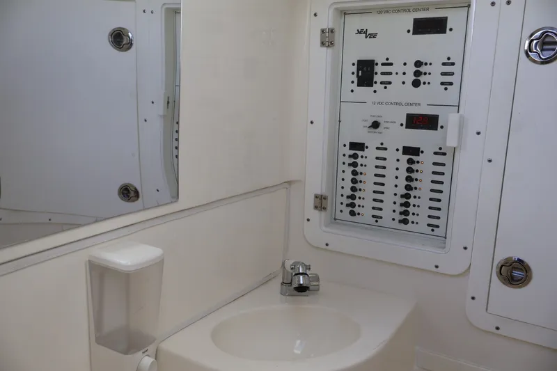 Slide: The Image of Control panel and sink in 2021 SeaVee 322Z boat interior. - 18