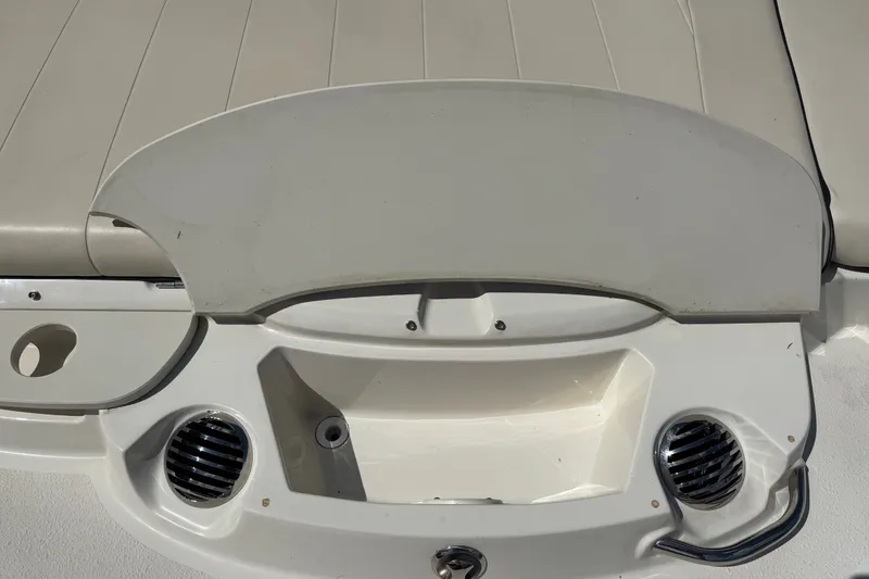 Slide: The Image of Rear view of a 2021 Stingray 208 LR boat with seating and speaker details. - 6