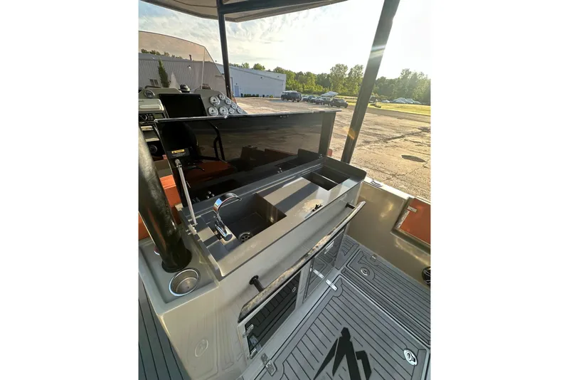 Slide: The Image of 2020 Dromeas D28 CC boat interior with control panel and sink. - 6