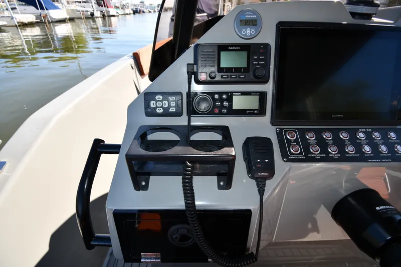 Slide: The Image of Control panel of 2020 Dromeas D28 CC boat with navigation and communication equipment. - 9