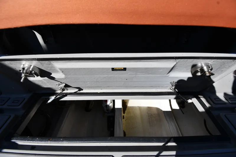 Slide: The Image of Open storage compartment on a 2020 Dromeas D28 CC boat, showcasing interior details. - 30
