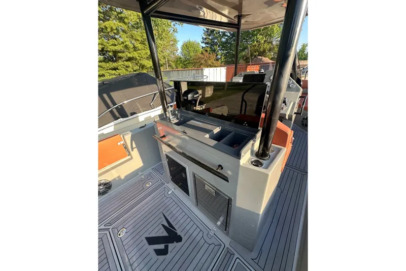 Slide: The Image of 2020 Dromeas D28 CC boat interior with modern console and sleek design. - 4