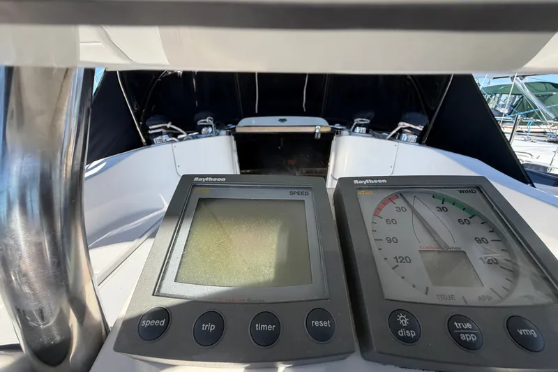Slide: The Image of Cockpit view of 2002 Hunter 356 sailboat with Raytheon navigation instruments. - 22