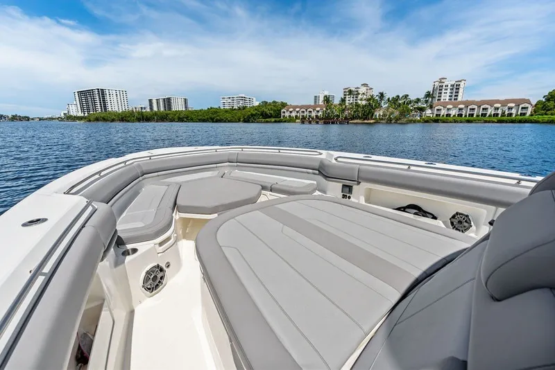 Slide: The Image of 2023 Boston Whaler 380 Outrage boat interior with waterfront cityscape view. - 22