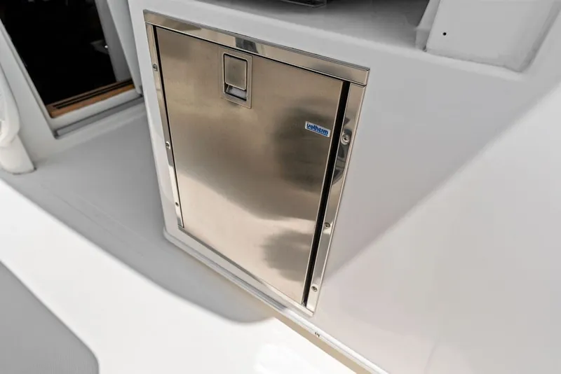Slide: The Image of Stainless steel compartment on 2023 Boston Whaler 380 Outrage boat. - 47