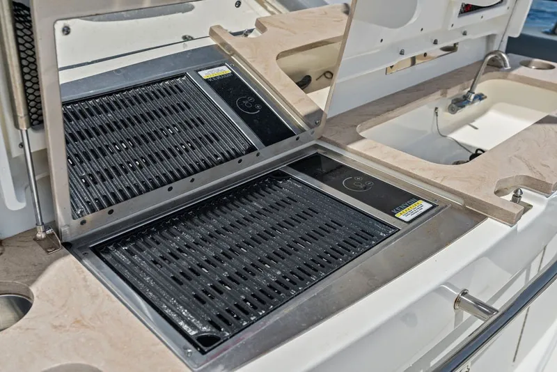 Slide: The Image of Outdoor grill and sink on 2023 Boston Whaler 380 Outrage boat. - 42