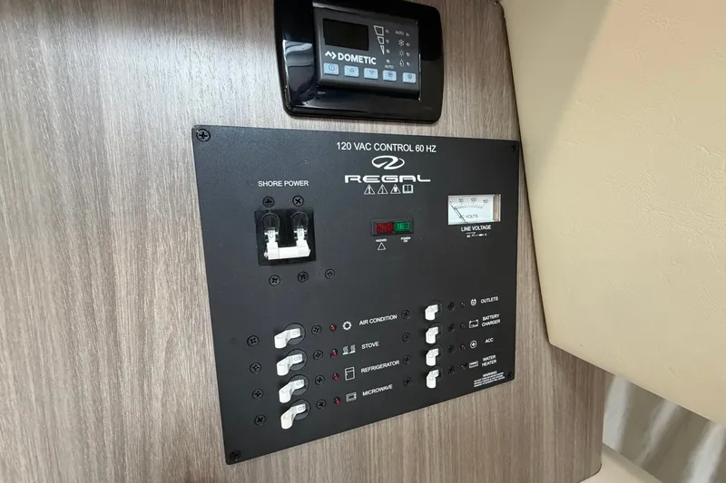 Slide: The Image of Control panel of a 2021 Regal 26 Express boat with Dometic display. - 30