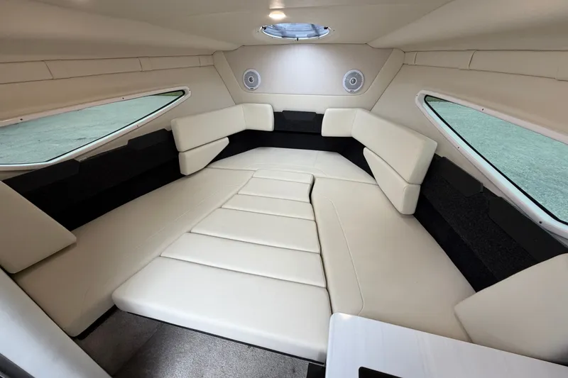Slide: The Image of 2021 Regal 26 Express cabin interior with plush seating and modern design. - 27
