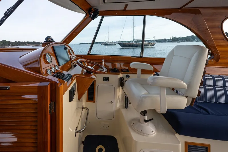 Slide: The Image of Interior of 2018 Hinckley Picnic Boat 34 MKII with helm and seating. - 17