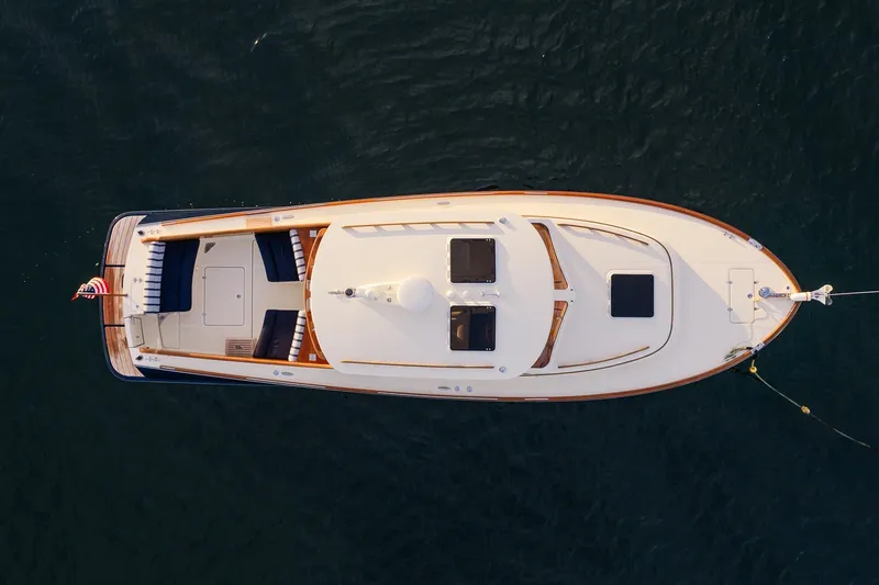 Slide: The Image of Overhead view of 2018 Hinckley Picnic Boat 34 MKII on calm water. - 4