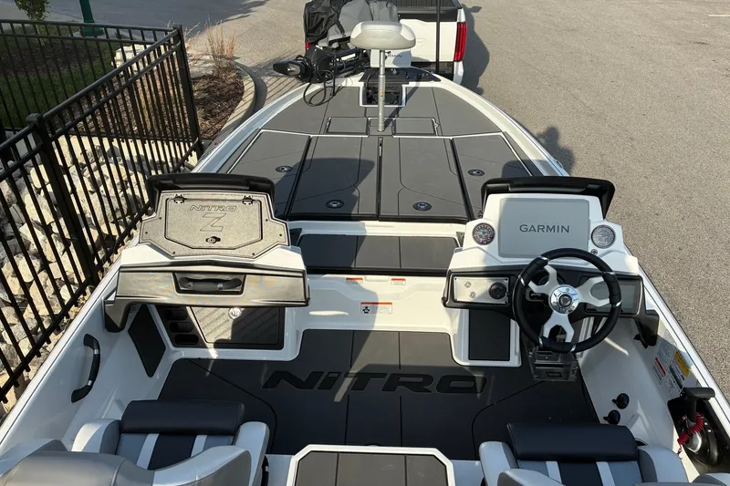 Slide: The Image of 2026 Nitro Z21 XL Pro boat interior with Garmin dashboard and seating. - 9
