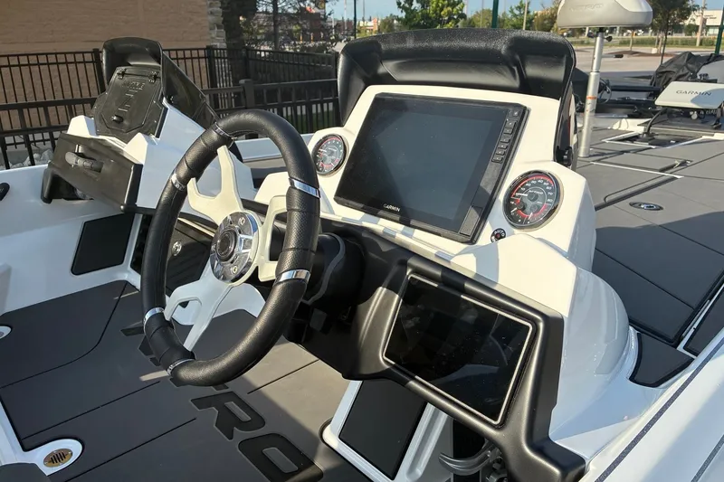 Slide: The Image of 2026 Nitro Z21 XL Pro boat dashboard with steering wheel and digital display. - 5