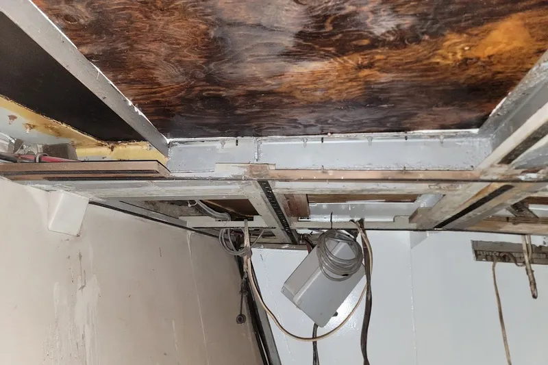 Slide: The Image of Interior view of a 1989 Custom Rob Ladd PH Motorsailer Cutter project, showing ceiling structure. - 37