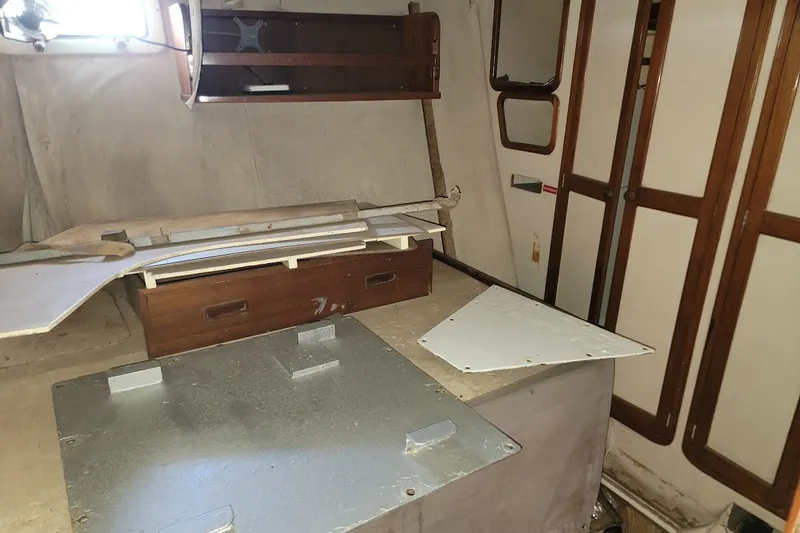 Slide: The Image of Interior of 1989 Custom Robb Ladd Pilothouse Cutter, showing unfinished cabin space. - 20