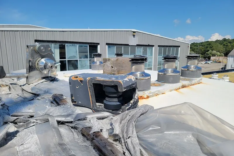 Slide: The Image of Rooftop view of 1989 Custom Robb Ladd Pilothouse Cutter, showcasing winches and equipment. - 26