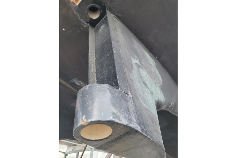 Slide: The Image of Close-up of a 1989 Rob Ladd PH Motorsailer Cutter's hull component, showcasing structural detail. - 61