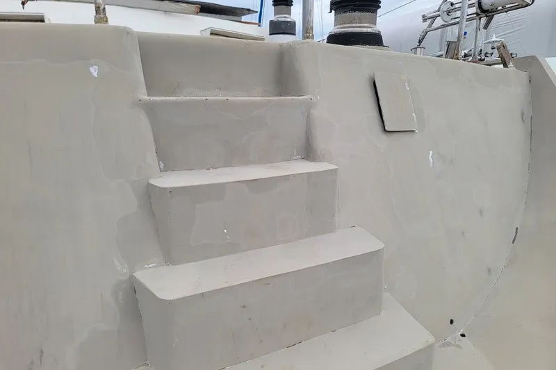 Slide: The Image of Steps on a 1989 Custom Rob Ladd PH Motorsailer Cutter, showcasing unfinished project details. - 53